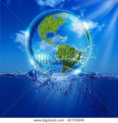 Water Earth globe over ocean waves