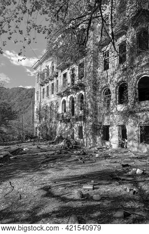 Abandoned House Destroyed By War. Mining Ghost-town Akarmara, Post-apocalyptic Concept. Remnant Of T