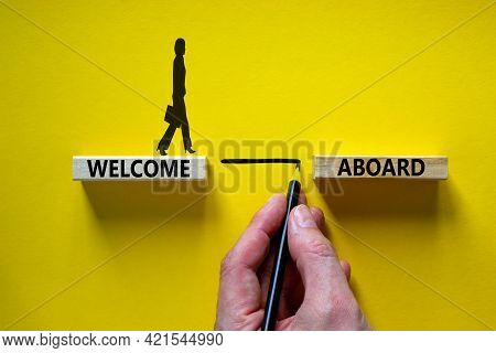 Welcome Aboard Symbol. Wooden Blocks With Words 'welcome Aboard'. Businessman Hand. Businesswoman Ic