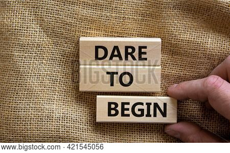 Dare To Begin Symbol. Wooden Blocks With Words 'dare To Begin'. Beautiful Canvas Background, Busines