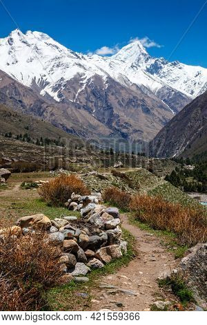 Old trade route in Himalaya surrounded with stones to Tibet from Chitkul village from Sangla Valley. Himachal Pradesh, India