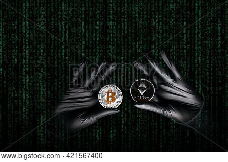 Hands In A Black Gloves Holding Bitcoin And Ethereum Coin. International Hacker Is Trying To Steel Y