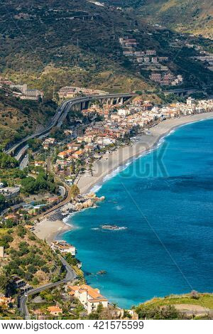 Aerial view of the sicilian coastline as seen from Taormina, province of Messina, Sicily, southern Italy.