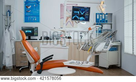 Interior Of Modern Equipped Dental Office With X Ray On Monitors, Dentist Stomatology Orthodontic Wo