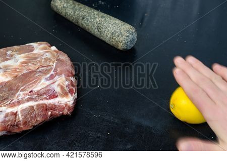 Homemade Capicola (coppa). Dry-cured Pork Loin Step-by-step Recipe. A Hand Presses And Rolls On The 