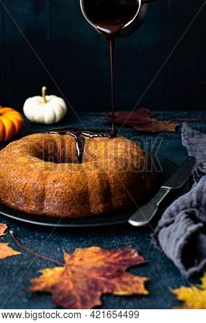 Chocolate covered pumpkin bundt cake