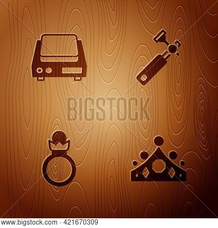 Set King Crown, Electronic Jewelry Scales, Diamond Engagement Ring And Jewelers Lupe On Wooden Backg