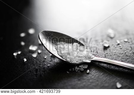 Amphetamine In Spoon On Black Background. Narcotic Recreational Drug Speed. Substance Abuse Concept.