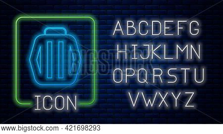 Glowing Neon Pet Carry Case Icon Isolated On Brick Wall Background. Carrier For Animals, Dog And Cat