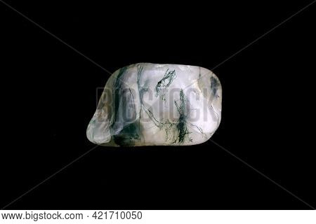 Moss Agate Jewel Stone Texture On Black Background. Macro Closeup.