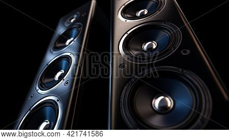 A Modern Surround Sound Speaker Arrangment On A Dark Backlit Studio Background - 3d Render