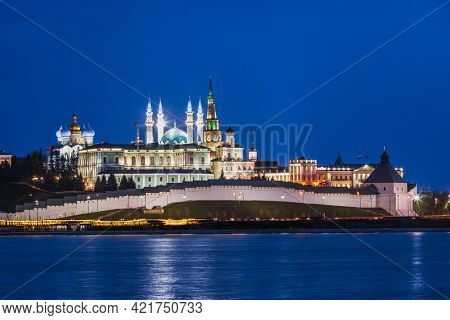 Illuminated Kazan Kremlin, a UNESCO World Heritage Site and historic citadel of Tatarstan, Russia, as viewed across the Kazanka river at night
