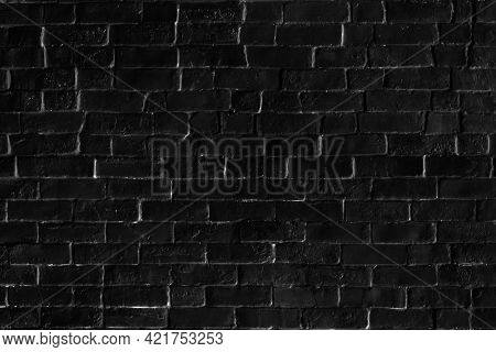 Black brick patterned background wallpaper
