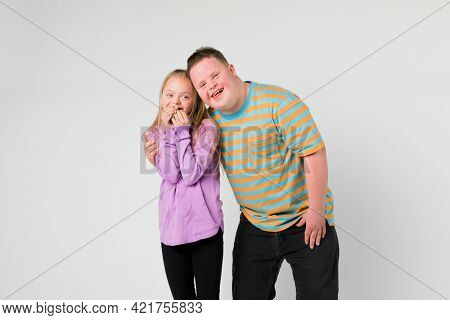 Cute siblings with down syndrome