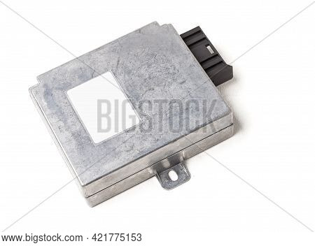 Plastic Car Engine Control Unit With Metal Elements On A White Isolated Background Is The Connecting