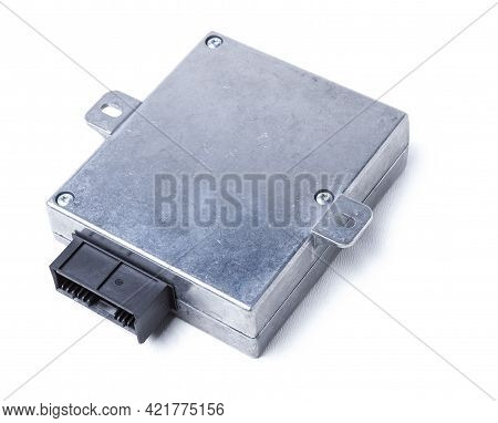 Plastic Car Engine Control Unit With Metal Elements On A White Isolated Background Is The Connecting