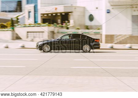 Moscow, Russia - May, 2021: Bmw 5 Seventh Generation G30, Car Driving In City With Motion Blur, View