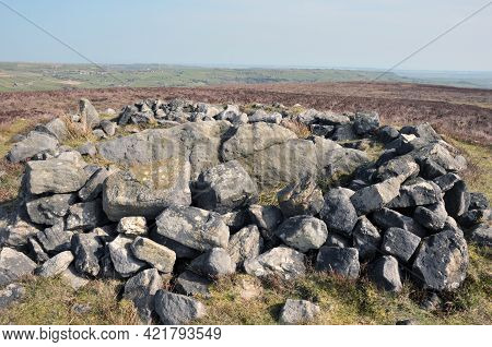 The Exposed Stones At The Top Of A Cairn Known As The Millers Grave On Midgley Moor In Calderdale We