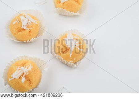 Toddy Palm Cake With Coconut (kanom Tarn) Made From Rice Flour, Palm Oil, Sugar And Salt On White Ba