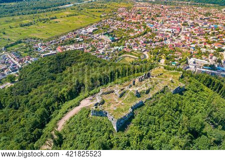 Panoramic View Of Ruins Of Khust Castle On The Mount And Mountain Valley With Khust City. View From 