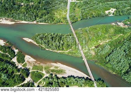 Panoramic Aerial View Of The River And Road Bridge. Beautiful River Banks, Rural Andscape, Skyview. 