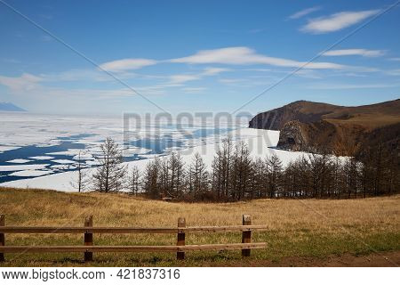 North Of Olkhon Island In Spring On A Sunny Warm Day. Beautiful View Of The Mountains, Larch Forest,