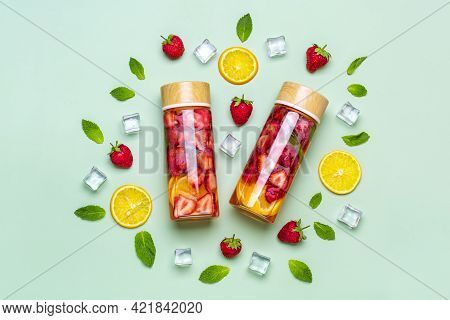 Strawberry Infused Water, Cocktail, Lemonade Or Tea. Summer Iced Cold Drink With Strawberry, Lemon A