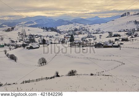 Winter Sunset In Sirnea Village, Brașov Romania