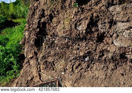 Anthropocene Soils With Layers Of Waste Layered In A Soil Probe. Plastics Characterize The Hectic Pe