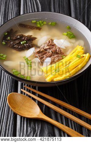 Traditional New Year's Dish Tteokguk Is A Soup Made With Sliced Rice Cakes, Usually In Beef Broth Cl