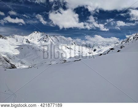 Ski Tour In The Beautiful Mountains Of Grisons. Winter Adventure Hike In The Mountains With Lots Of 