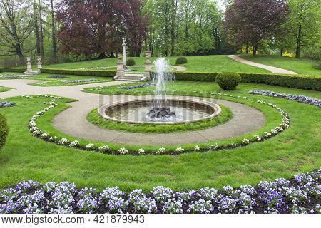 Lancut, Poland -may 5, 2013: Italian Garden In Front Of 16th Century Baroque Lancut Castle, Former P