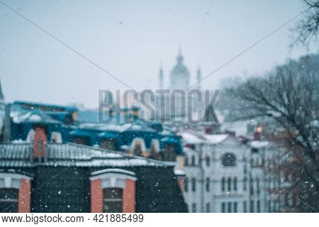 Copious Snowfall Over The City With The Roofs