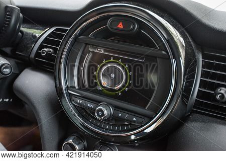 Germany - August 2015: Multimedia Screen In The Minicouper Car Sharing. Close-up Of The Company Sign