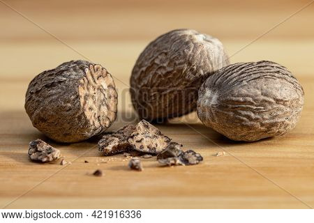 Nutmeg Isolated. Whole Nuts And Nutmeg Powder Isolated On White Background