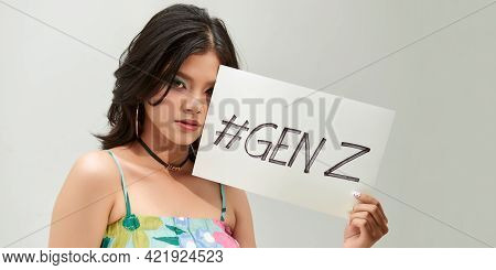 Beautiful Asian Woman Holding A Paper With #genz