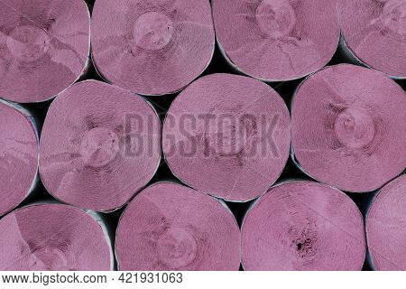 Top View Of Many Rolls Of Pink Soft Toilet Paper. Family Multipack. Background, Close-up.