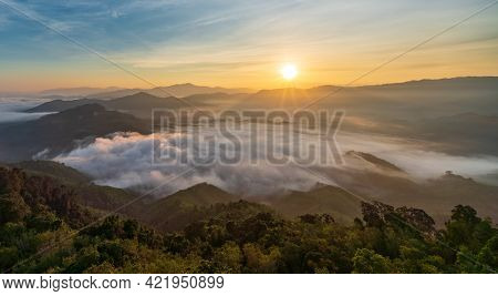Beautiful Morning Sunrise And Fog Flow Over Mountain In Ai Yerweng, Yala, Thailand