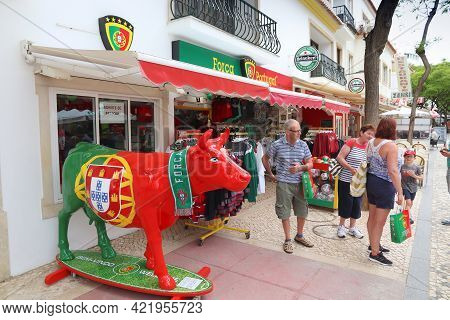 Albufeira, Portugal - May 30, 2018: People Shop For Souvenirs In Downtown Albufeira, Portugal. Forca