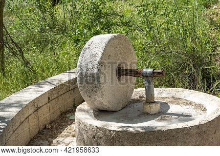 The Millstone, Olive Oil Press Squeeze Out Olive Oil. The Old Way
