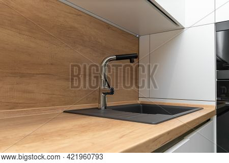 Interior Of A Modern Kitchen With A Faucet And Sink, Minimalism