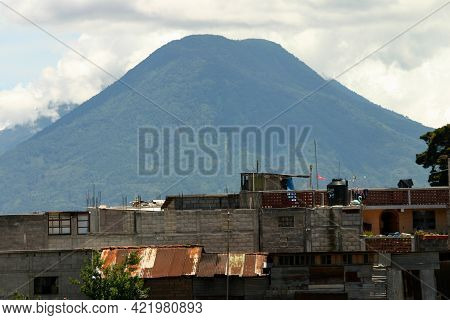 Solola, Guatemala, August 9, 2006: View Of The Volcano Atitlan And The Poverty In The Small City Of 