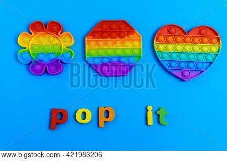 Toy Pop It. Poppit Is A New Fidget Toy, Popular Among Children And People With Special Needs. On A B