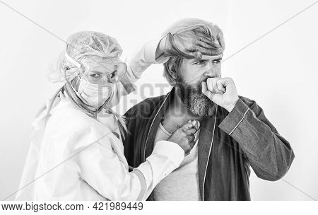 Diagnosis Of Pneumonia. Doctor Protective Equipment Examines Patient Suspected Coronavirus Infection