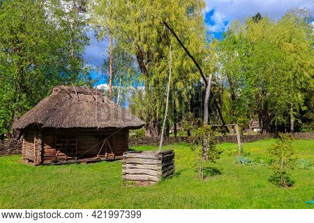 Old Traditional Wooden Shadoof In Village In Ukraine