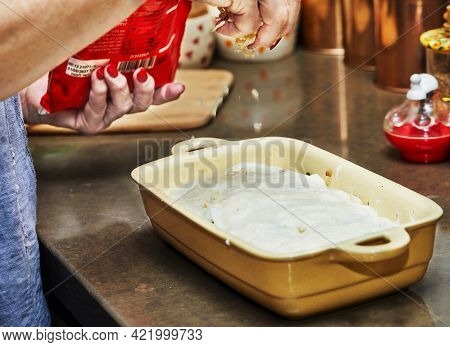 Woman Pours Parmesan Into Form With Goat Cheese And Sorrel For Lasagna, Step By Step Recipe From The