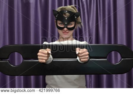 Beautiful Pretty Girl In Wooden Black Shackles, Bdsm.