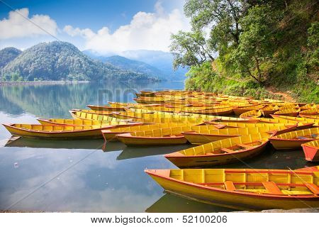 Fishing boat at Bengas lake in Pokhara , Nepal. One of the most beautiful Lakes of Pokhara Valley is the well-known Phewa Lake.