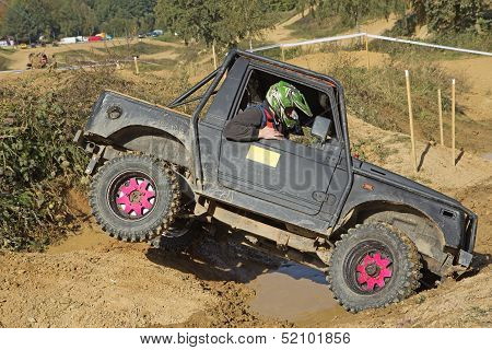 Offroad Car Is Overcoming A Difficult Terrain