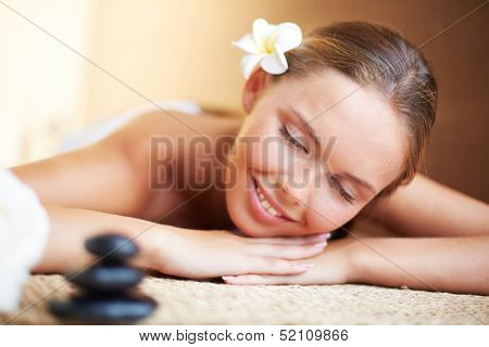 Portrait of young female ready for the procedure of massage